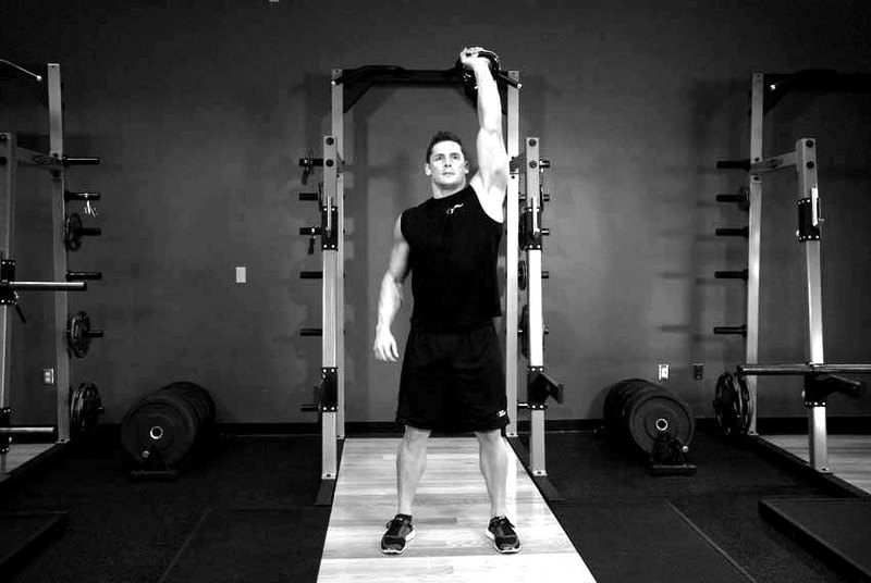 Kettlebell Arnold Press — end position demonstration photo