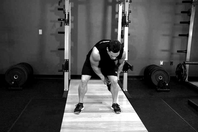 Kettlebell Figure 8 — start position demonstration photo