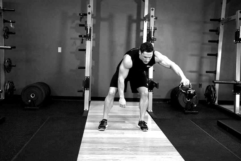 Kettlebell Pass Between The Legs — start position demonstration photo