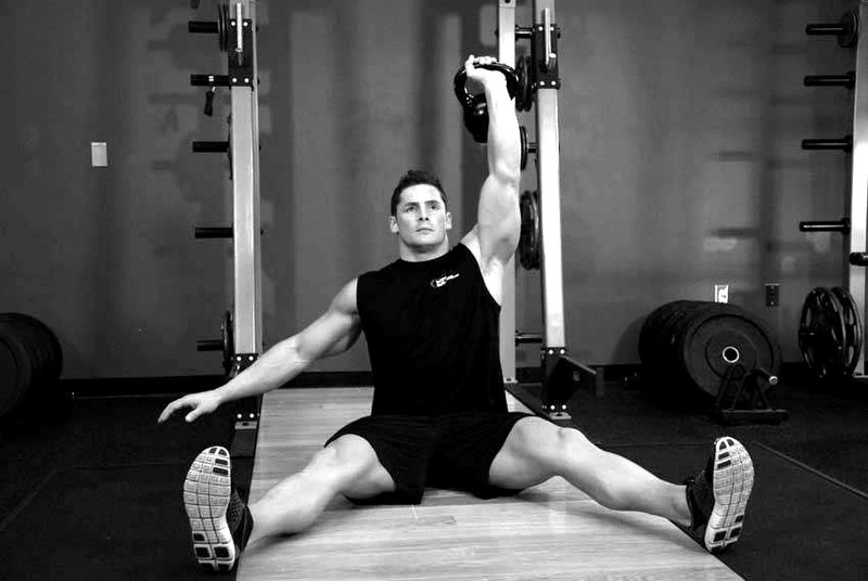 Kettlebell Seated Press — end position demonstration photo