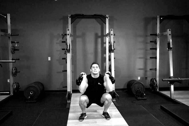 Kettlebell Thruster — end position demonstration photo
