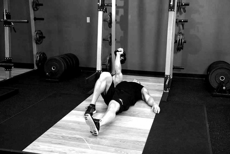Kettlebell Turkish Get-Up (Lunge style) — start position demonstration photo