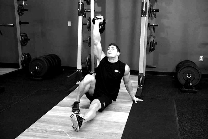 Kettlebell Turkish Get-Up (Lunge style) — end position demonstration photo