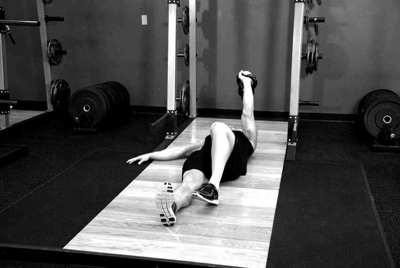 Kettlebell Turkish Get-Up (Squat style) — start position demonstration photo