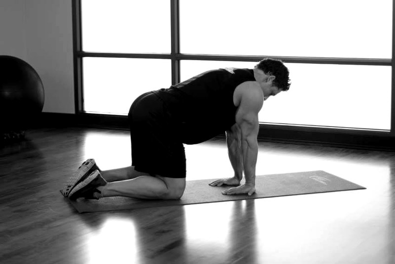 Kneeling Forearm Stretch — start position demonstration photo