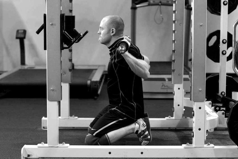 Kneeling Squat — end position demonstration photo
