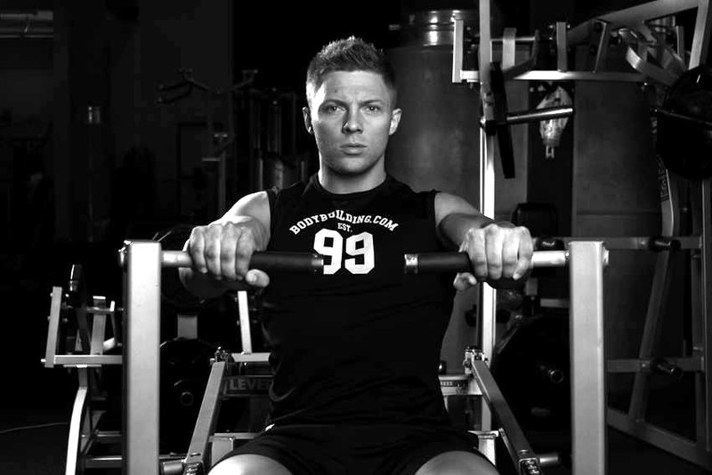 Leverage Chest Press — end position demonstration photo