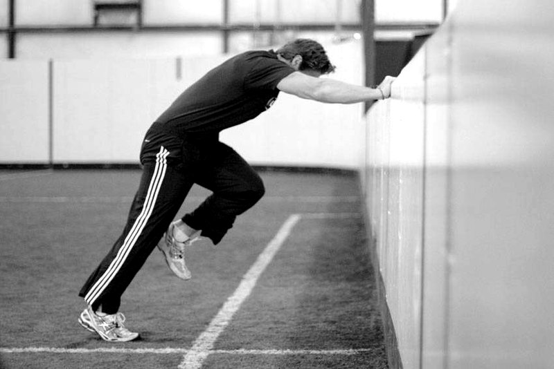 Linear Acceleration Wall Drill — start position demonstration photo
