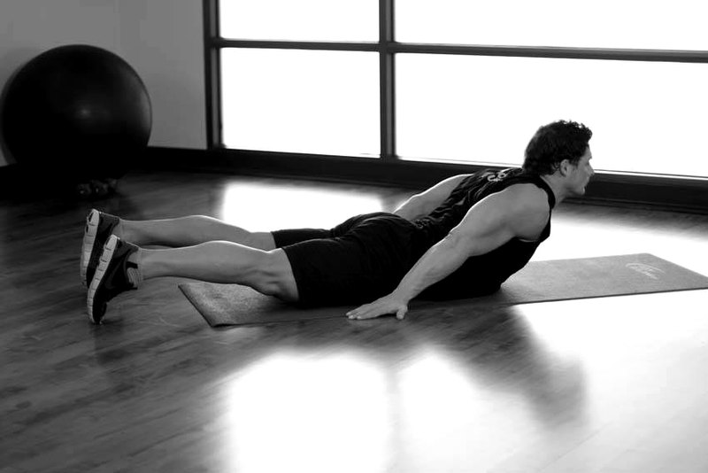 Lower Back Curl — end position demonstration photo