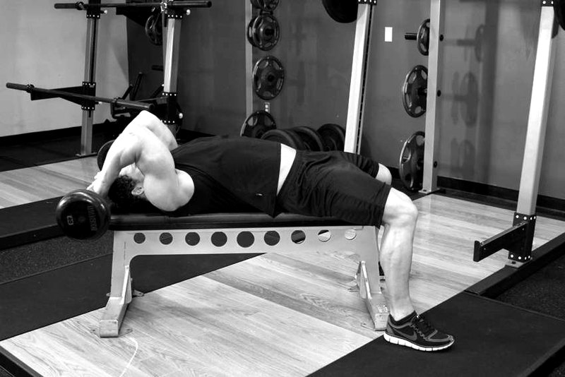 Lying Close-Grip Barbell Triceps Extension Behind The Head — start position demonstration photo