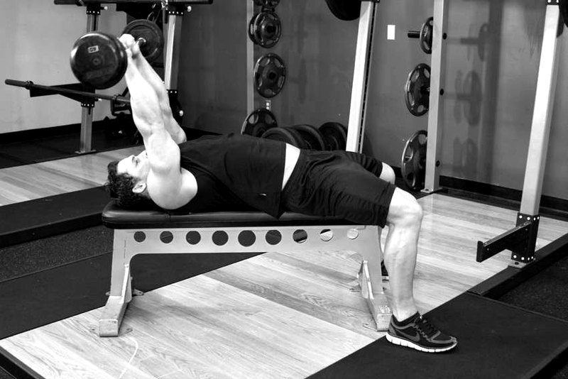 Lying Close-Grip Barbell Triceps Extension Behind The Head — end position demonstration photo