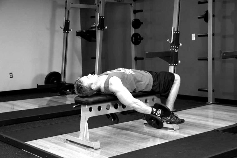 Lying Supine Dumbbell Curl — end position demonstration photo