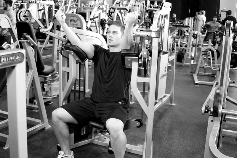 Machine Bicep Curl — start position demonstration photo