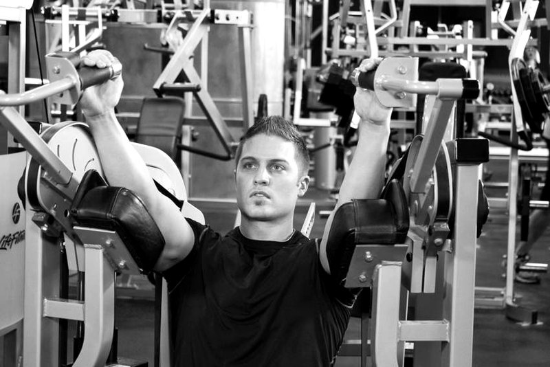 Machine Triceps Extension — end position demonstration photo