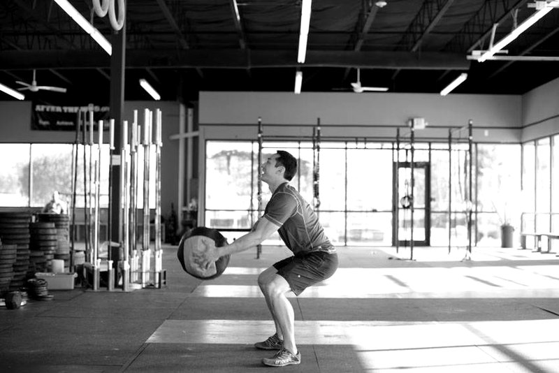 Medicine Ball Scoop Throw — start position demonstration photo