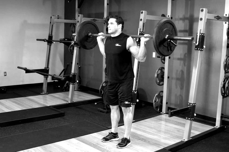 Narrow Stance Squats — start position demonstration photo