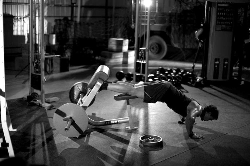Natural Glute Ham Raise — end position demonstration photo