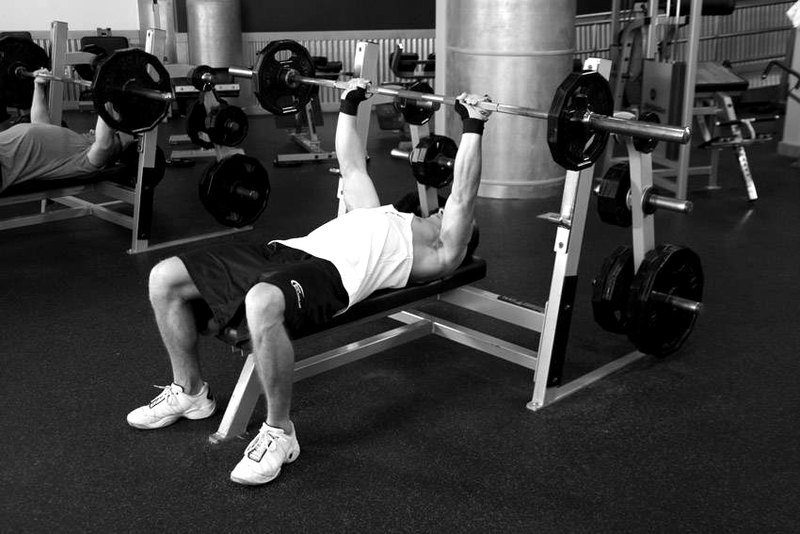 Neck Press — end position demonstration photo