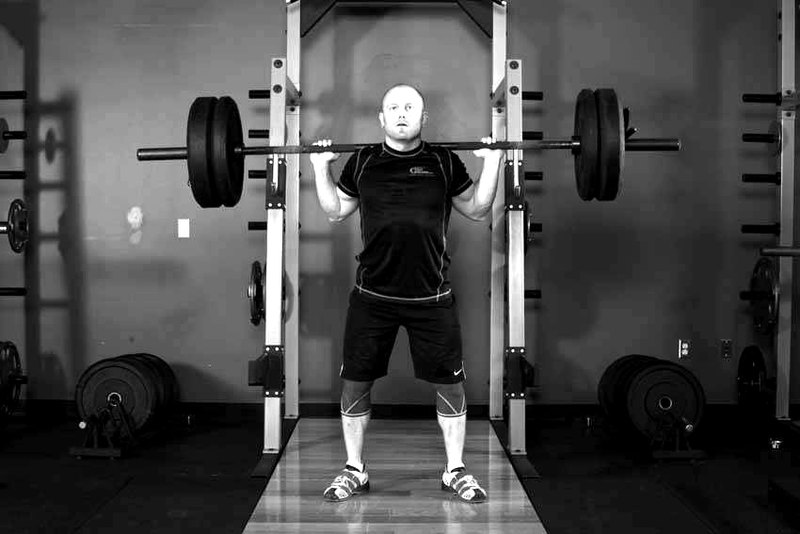 Olympic Squat — start position demonstration photo