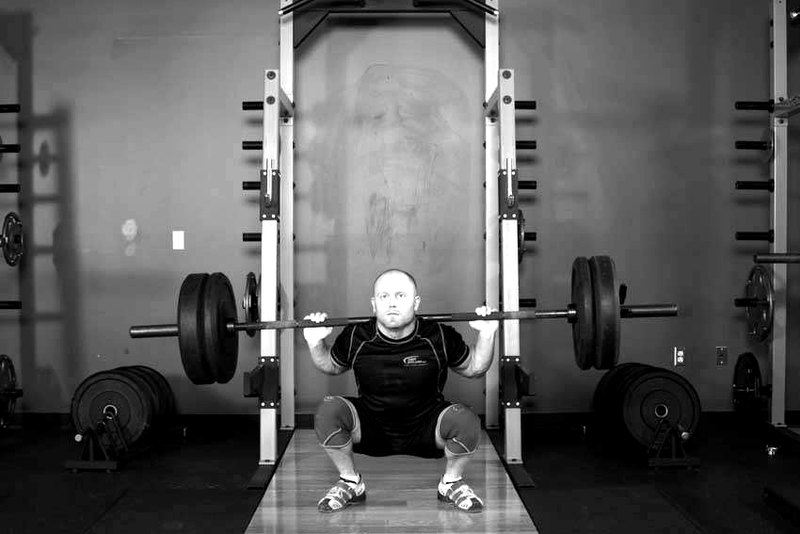 Olympic Squat — end position demonstration photo