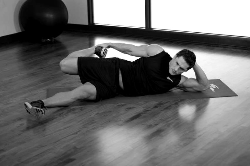 On Your Side Quad Stretch — end position demonstration photo