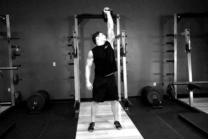 One-Arm Kettlebell Military Press To The Side — end position demonstration photo