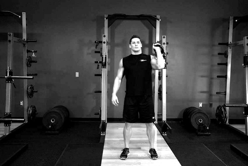 One-Arm Kettlebell Push Press — start position demonstration photo