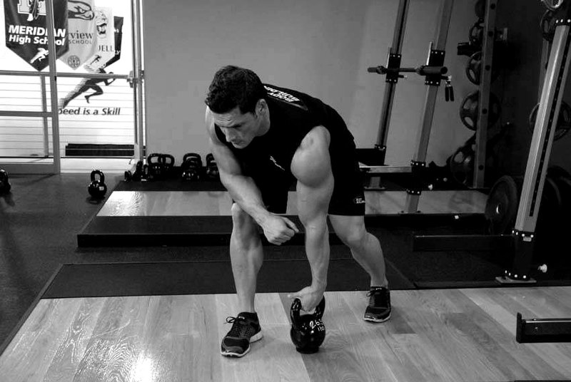 One-Arm Kettlebell Row — start position demonstration photo