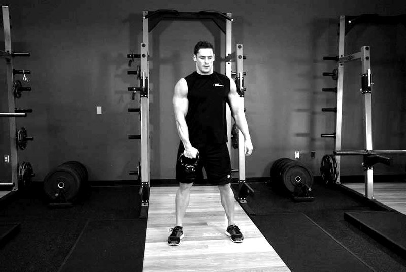One-Arm Kettlebell Snatch — start position demonstration photo