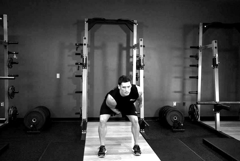 One-Arm Kettlebell Snatch — end position demonstration photo