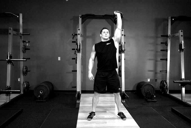 One-Arm Overhead Kettlebell Squats — start position demonstration photo