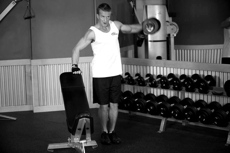 One-Arm Side Laterals — end position demonstration photo