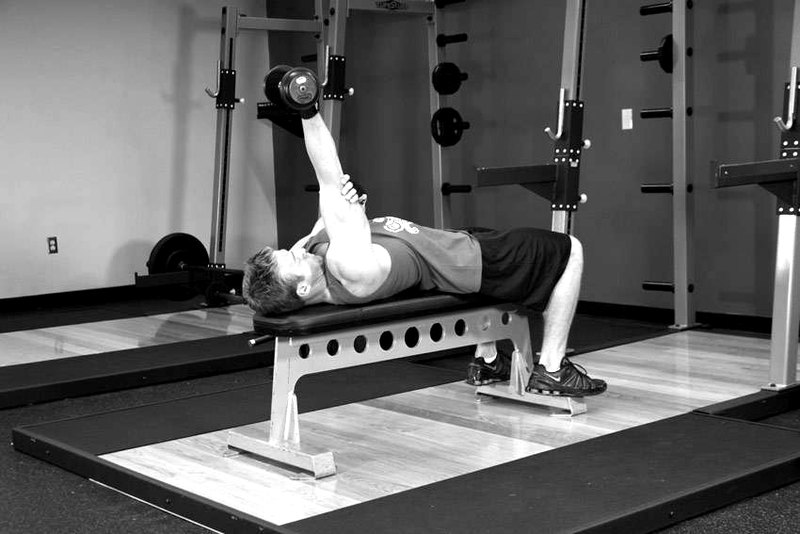 One Arm Supinated Dumbbell Triceps Extension — end position demonstration photo