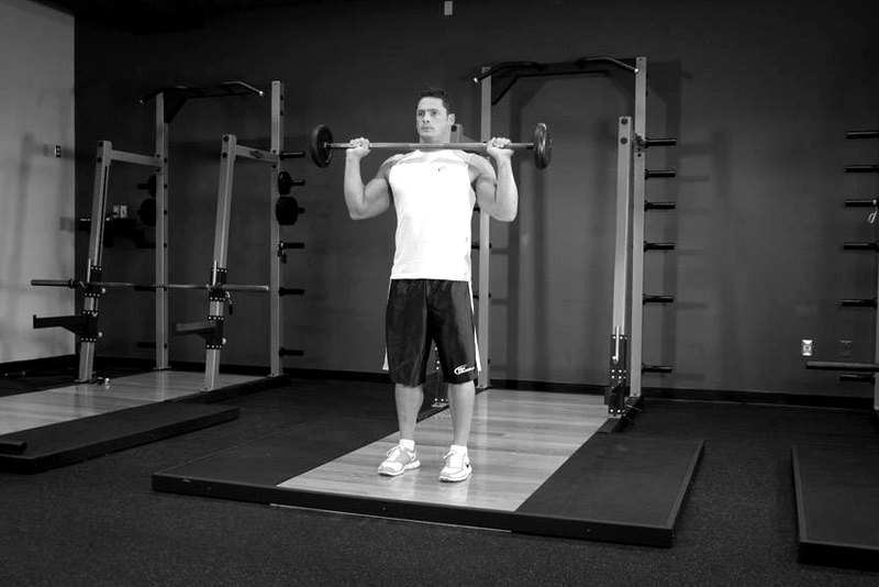 Standing Overhead Press — start position demonstration photo