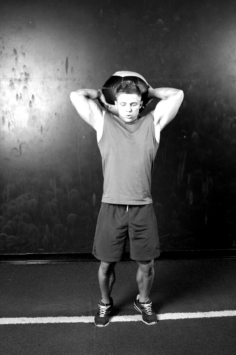 Overhead Slam — start position demonstration photo