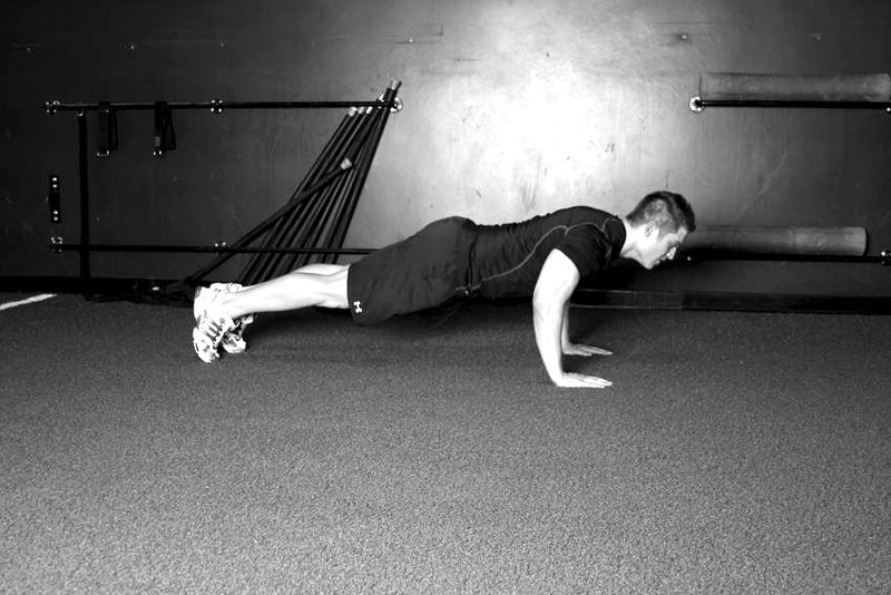 Plyo Push-up — end position demonstration photo