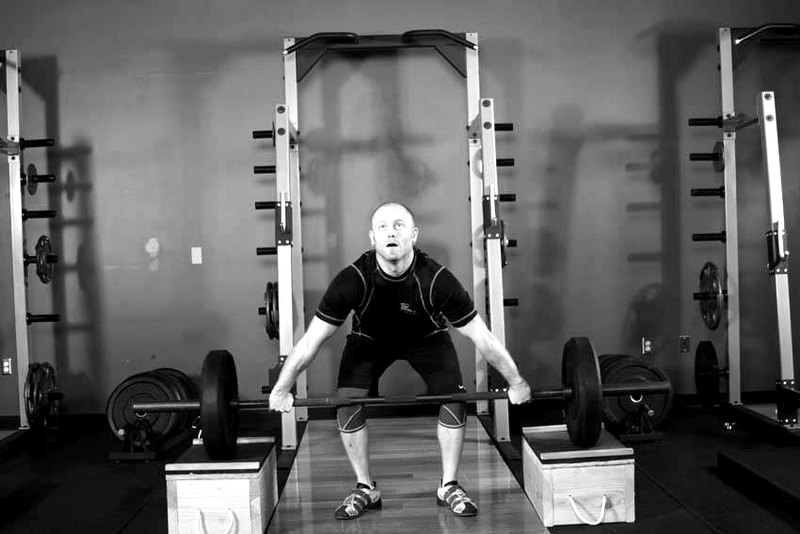 Power Snatch from Blocks — start position demonstration photo