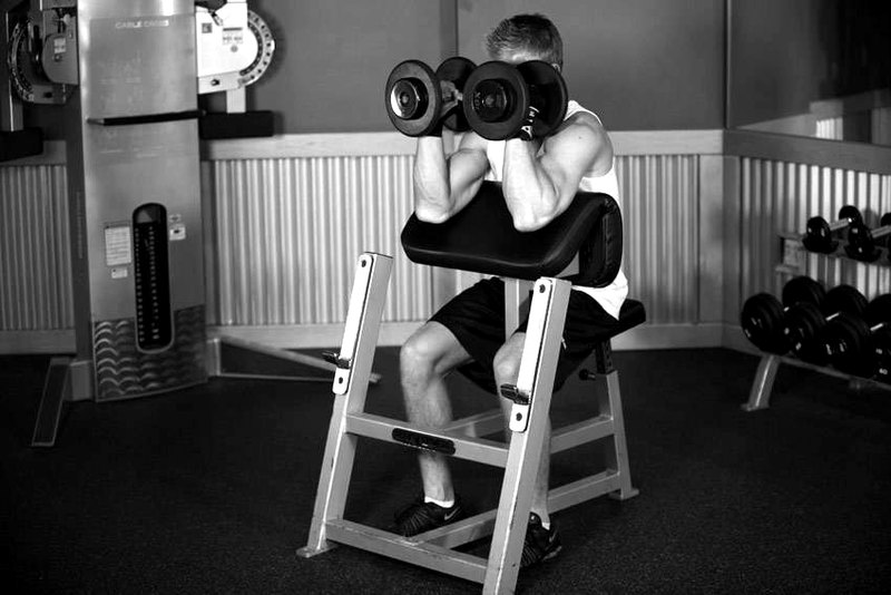 Preacher Hammer Dumbbell Curl — end position demonstration photo