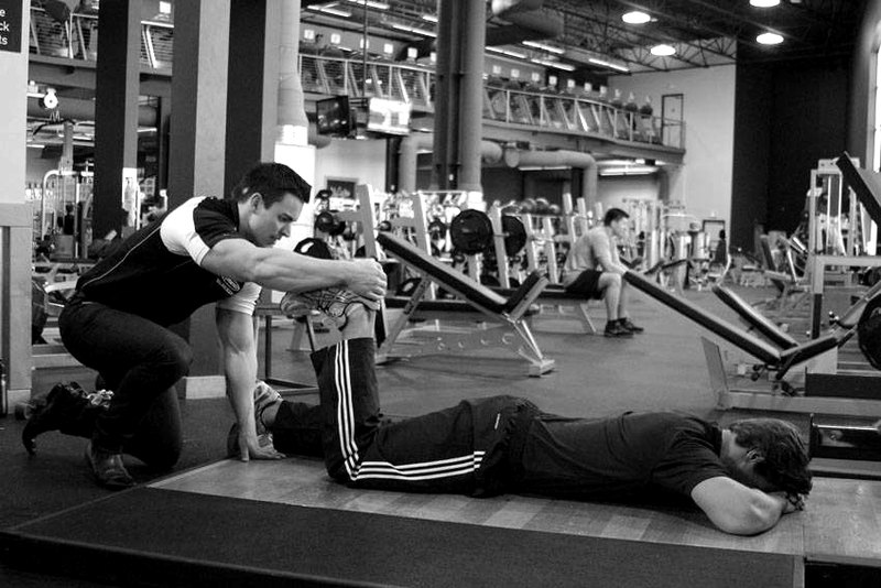 Prone Manual Hamstring — end position demonstration photo