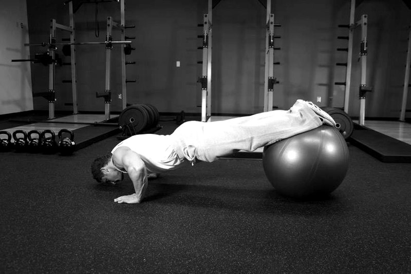 Push-Ups With Feet On An Exercise Ball — start position demonstration photo