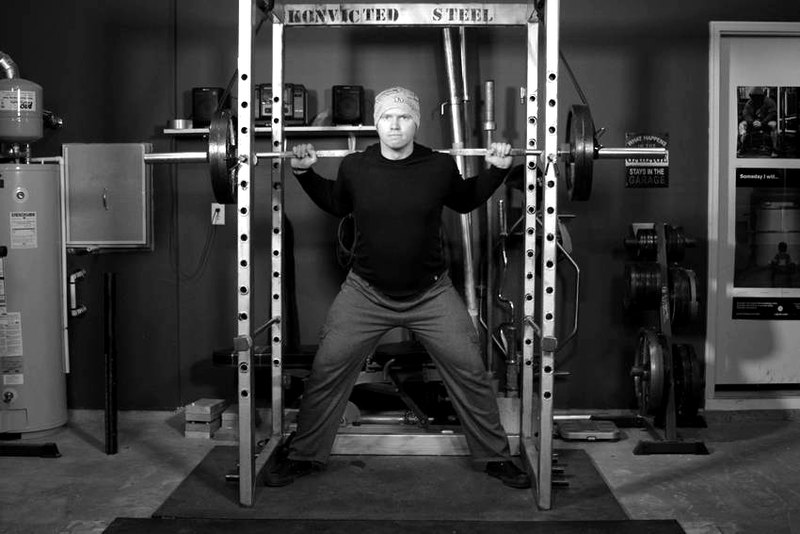 Reverse Band Power Squat — start position demonstration photo