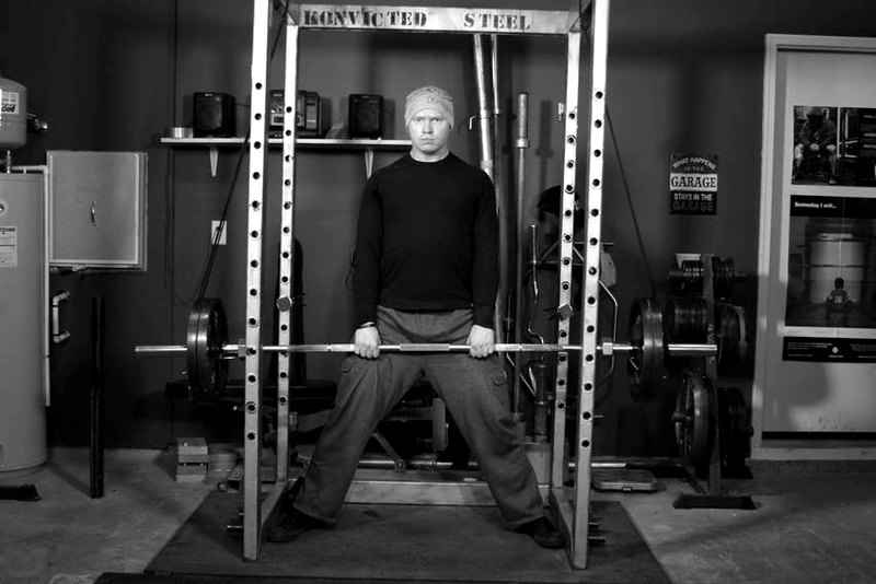 Reverse Band Sumo Deadlift — end position demonstration photo