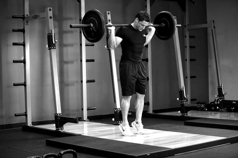Rocking Standing Calf Raise — end position demonstration photo