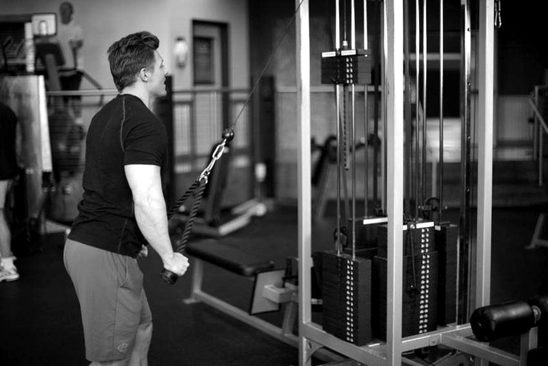 Rope Straight-Arm Pulldown — end position demonstration photo