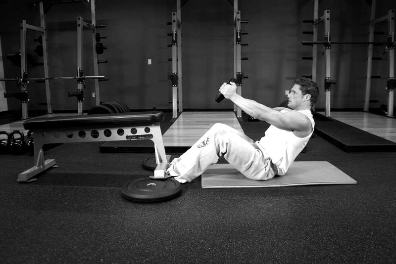Russian Twist — start position demonstration photo