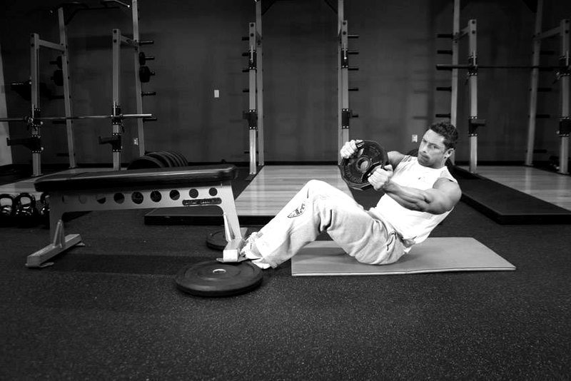 Russian Twist — end position demonstration photo