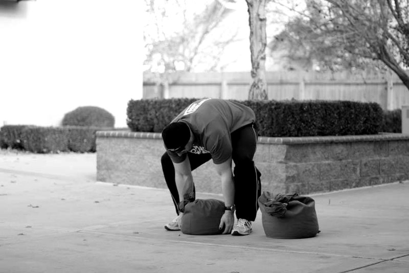 Sandbag Load — start position demonstration photo