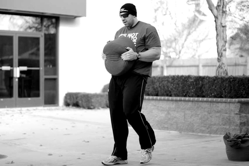 Sandbag Load — end position demonstration photo