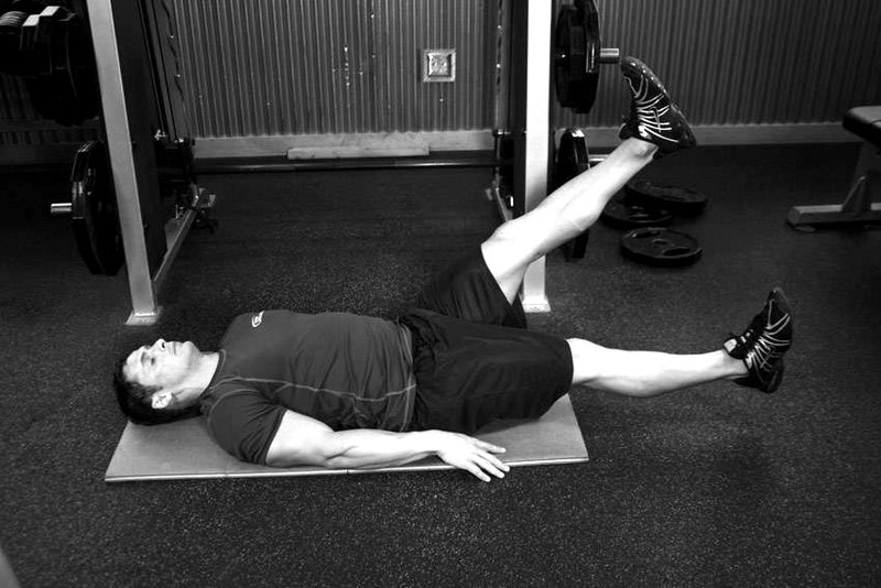 Scissor Kick — start position demonstration photo
