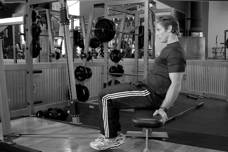 Seated Band Hamstring Curl — end position demonstration photo